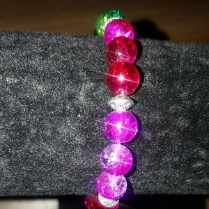 Handmade Glass beaded bracelet with a music charm
